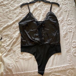 Black bodysuit. NWT. Size 10